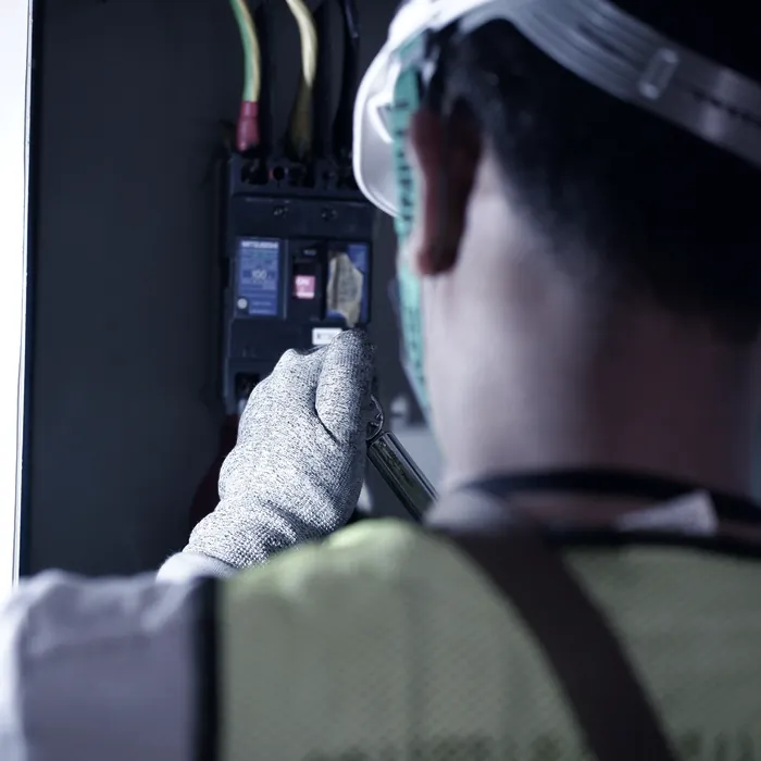 Engineer working on an electrical cabinet
